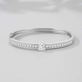 Timeless Sparkle: Elegant Sterling Silver Bangle with Central Stone